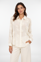 Blusa con apliques florales