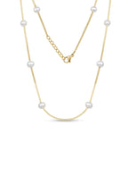 Collar minimalista con perlas separadas