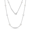 Collar minimalista con perlas separadas
