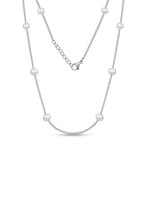 Collar minimalista con perlas separadas