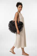 Bolsa de rafia doblada